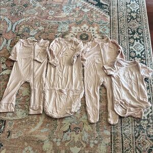 Kyte Baby 4 Piece Bundle in Blush Pink Footie, Romper, Bundler, & Bodysuit
